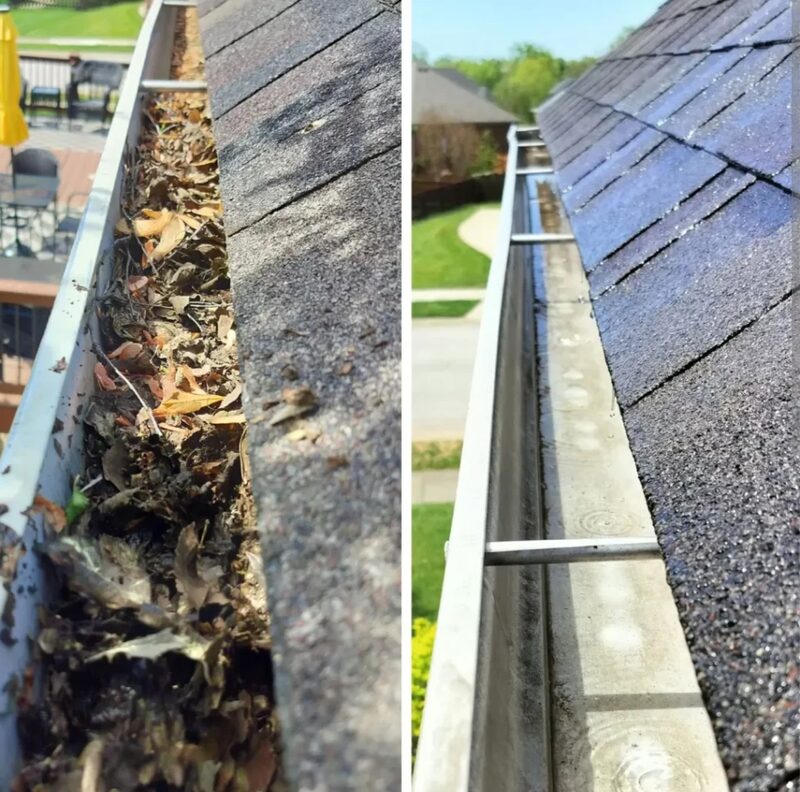 Clogged gutter full of rotting debris cleaned to bare metal
