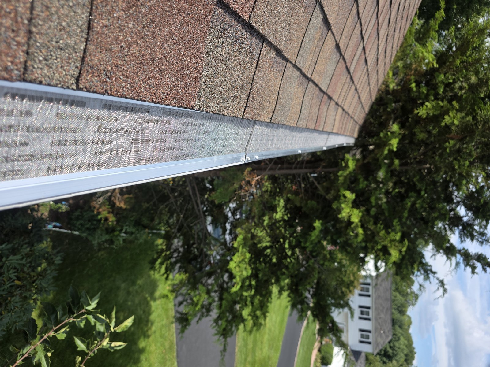 Completed micro mesh gutter guard run on a local home